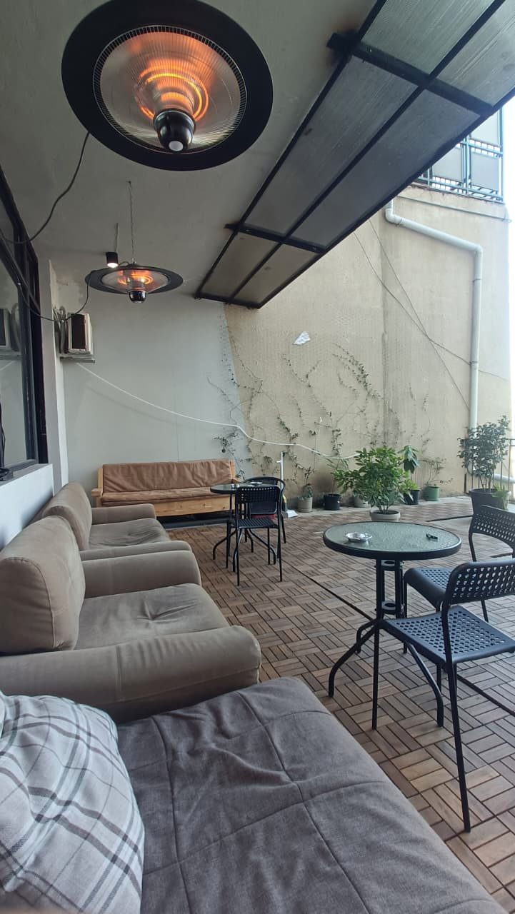 Covered terrace lounge with heaters